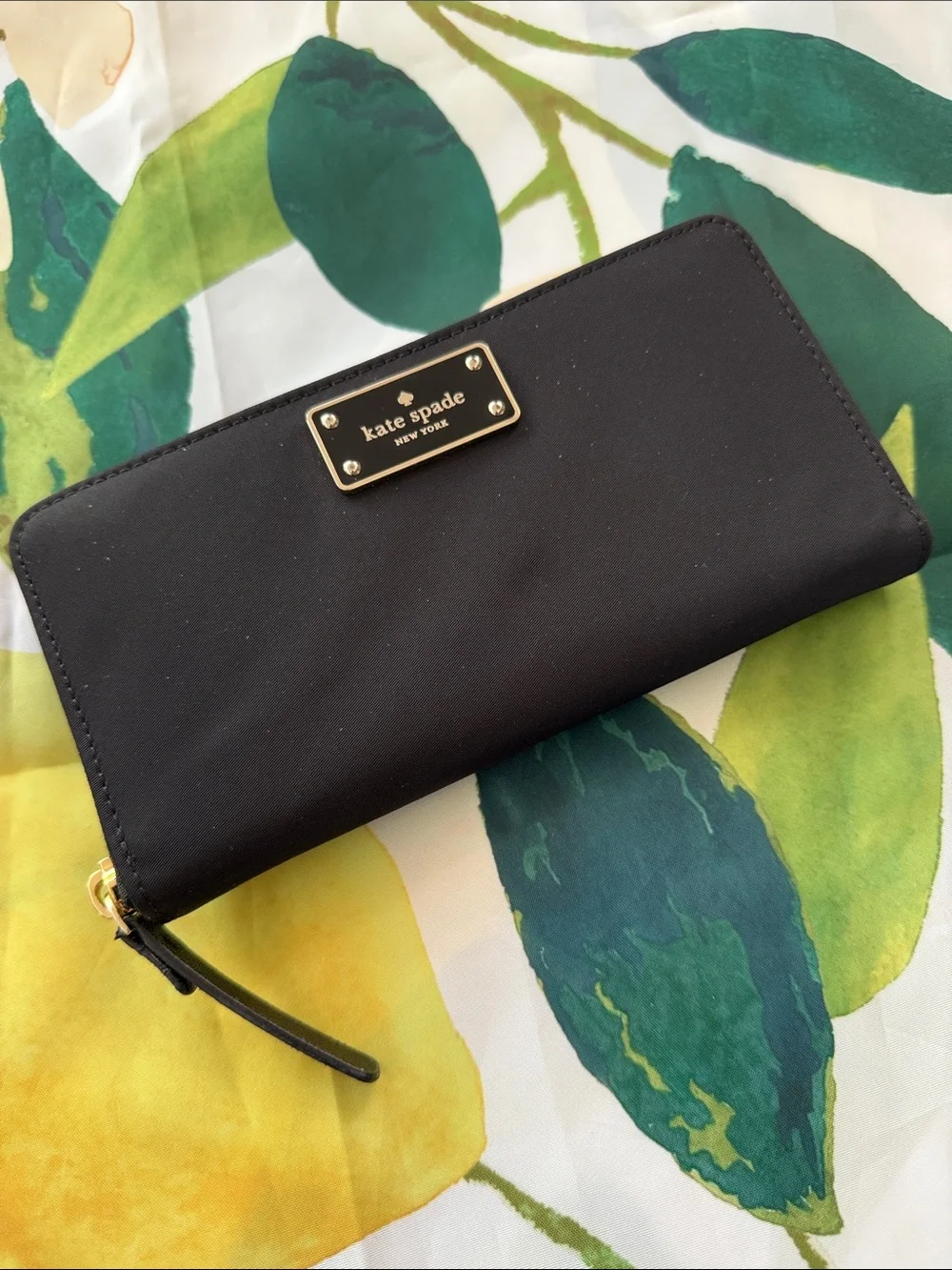 kate spade black zip-around wallet with gold plaque